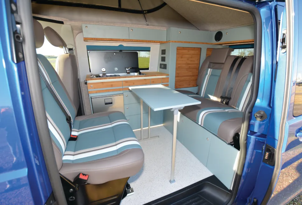The Out and About Campers risig roof campervan interior