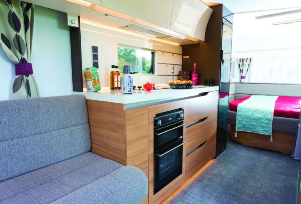 The-fridge,-on-the-aft-end-of-the-ktichen,-is-the-tall,-slimline-133-litre-capacity-model-from-Thetford-65187
