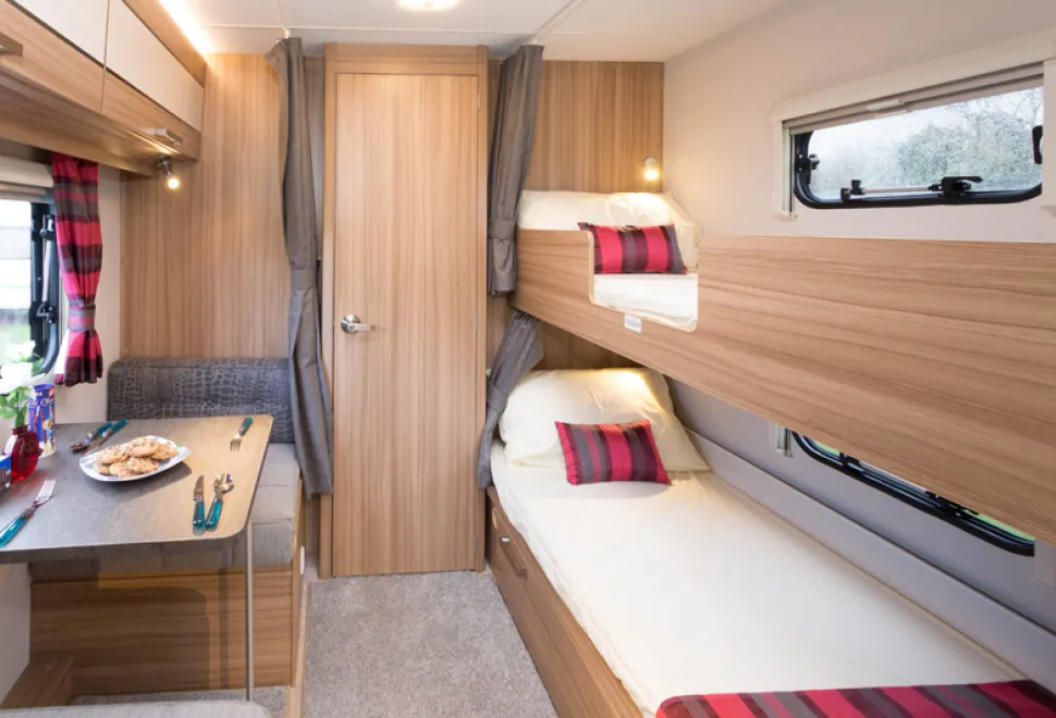 web-4-The-cosy-bunk-“bedroom”-is-integrated-with-the-dining-area-87888
