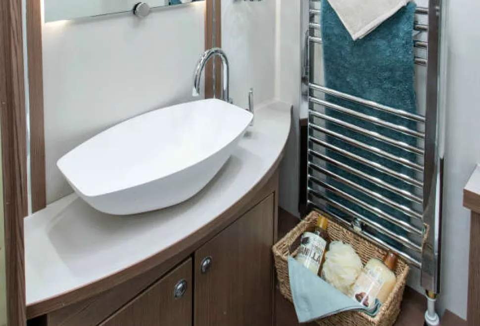 A-large-Alde-heated-towel-rail-alongside-the-washbasin-67090