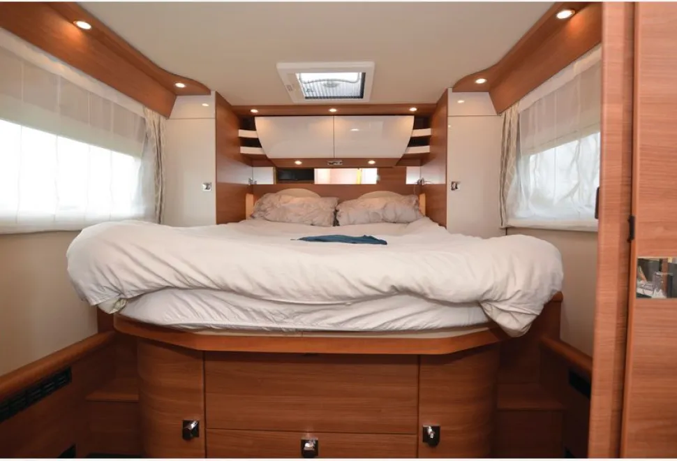 Carthago Chic C-line I 6.2 XL QB A-class motorhome bedroom