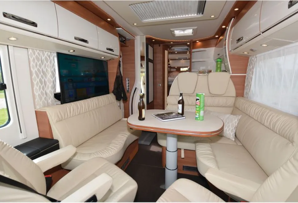 Carthago Chic C-line I 6.2 XL QB A-class motorhome lounge