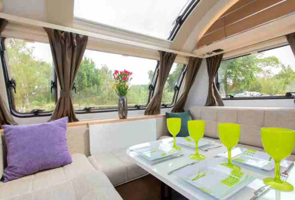 The-white-panel-behind-the-centre-front-seat-is-a-hinge-up-coffee-table-10995