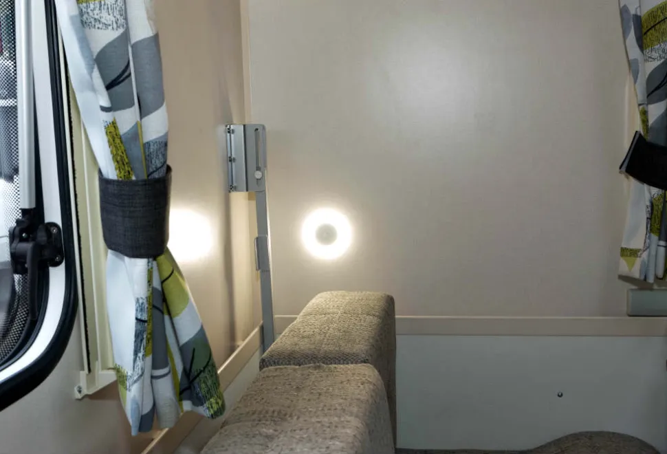 Two-exceptionally-bright-circles-of-LEDs-are-on-the-rear-wall-62565