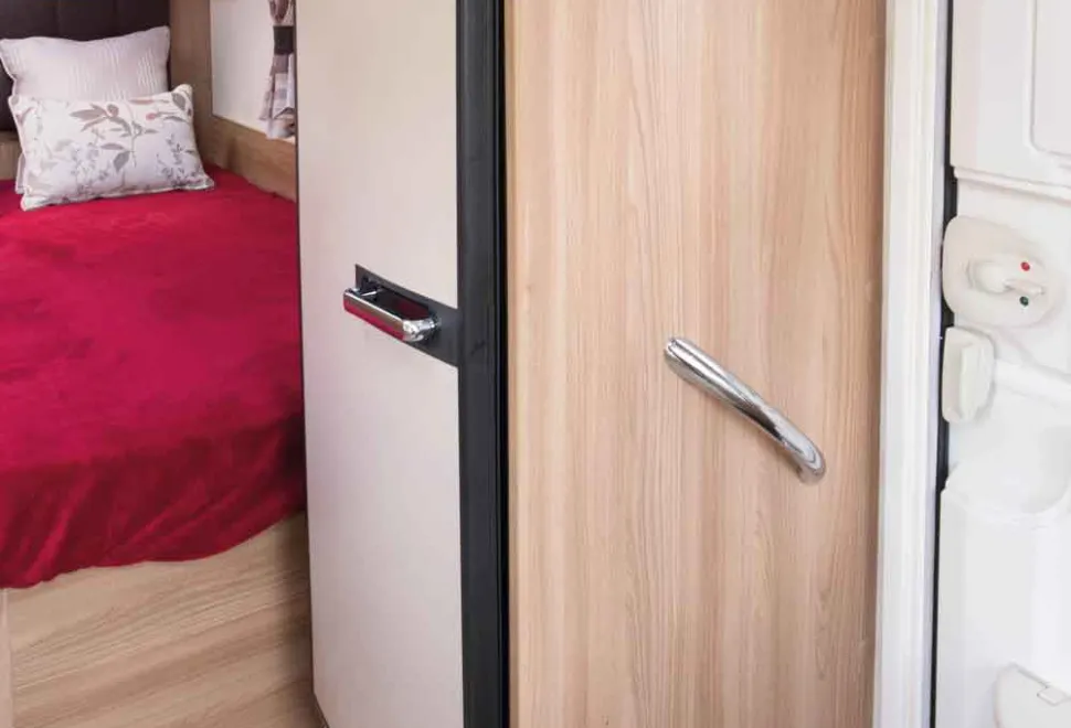 The-The-tall,-slim-line-fridge-freezer-is-opposite-the-kitchen-71019