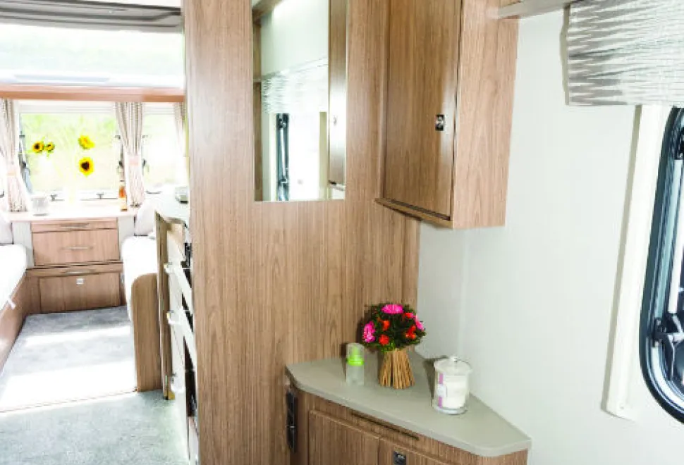 A-corner-dressing-table-complete-with-a-socket-for-a-hairdryer-w500-83556