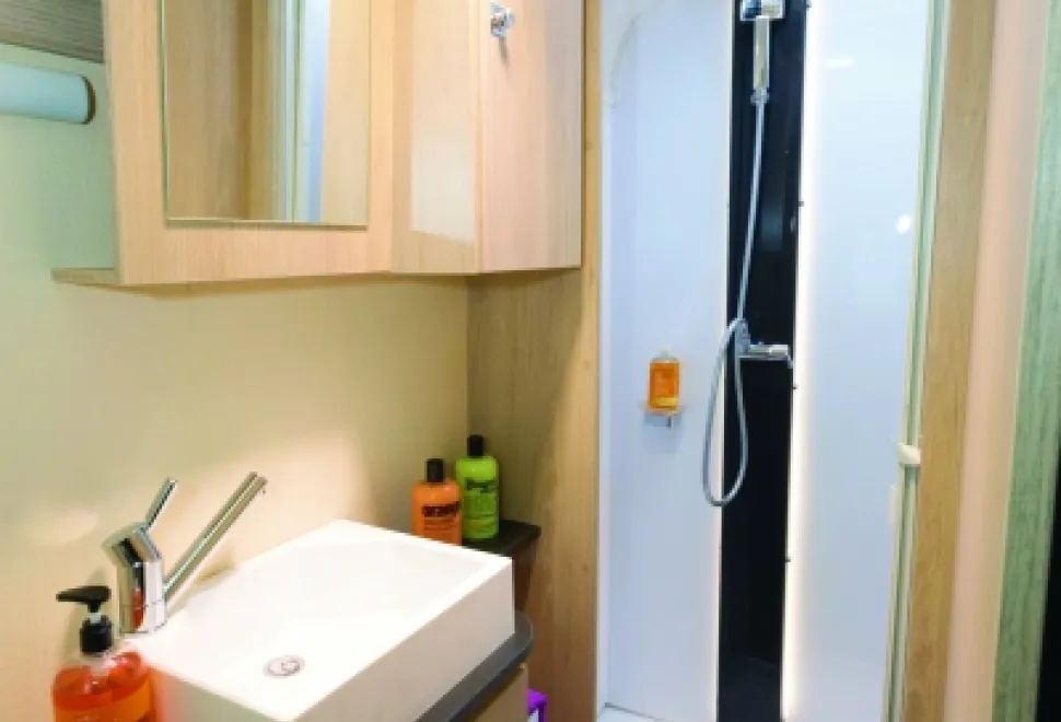 The-shower-room-is-very-British-in-design,-with-the-shower-in-the-nearside,-the-loo-on-the-offside-and-the-basin-in-the-middle-28680