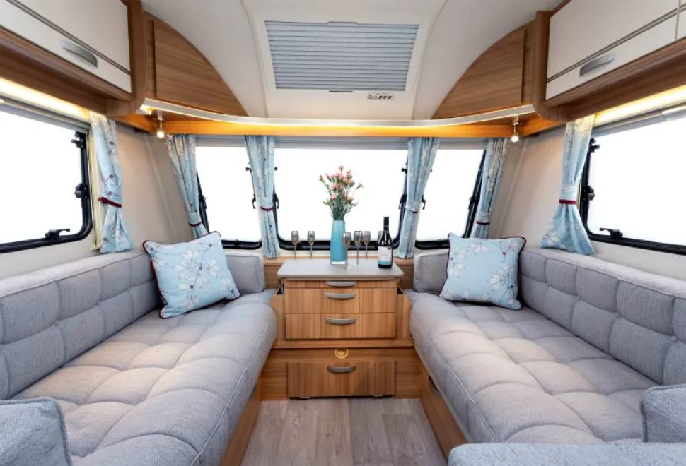 Soft-grey-and-pastel-blue-with-bold,-blackberry-colour-in-the-curtain-and-cushion-pattern;-a-lovely-colour-scheme-2-89335