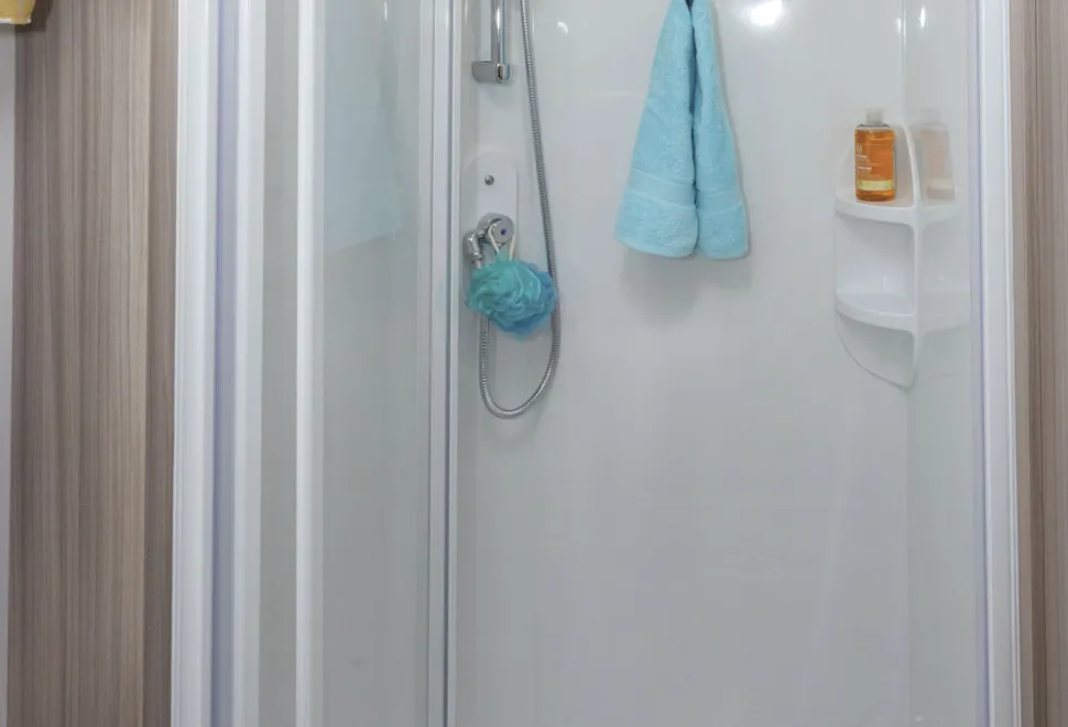 The-small,-hinge-out-towel-hook-in-the-shower-is-neat-and-practical-40071