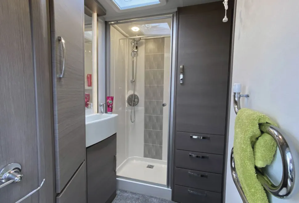 Two-wardrobes-are-in-the-large-shower-room.-Notice-the-rock-effect-&rsquo;tiling&rsquo;-panel-in-the-shower-and-the-Alde-towel-warmer;-very-rerfined-33191