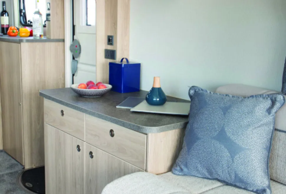 A-capacious-double-doored-cabinet-below-the-dresser-and-a-microwave-at-a-convenient-height-for-most-people-w500-11997