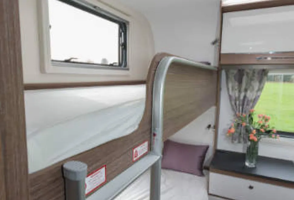 Two-bunks,-each-with-a-large-window-alongside-w350-53607