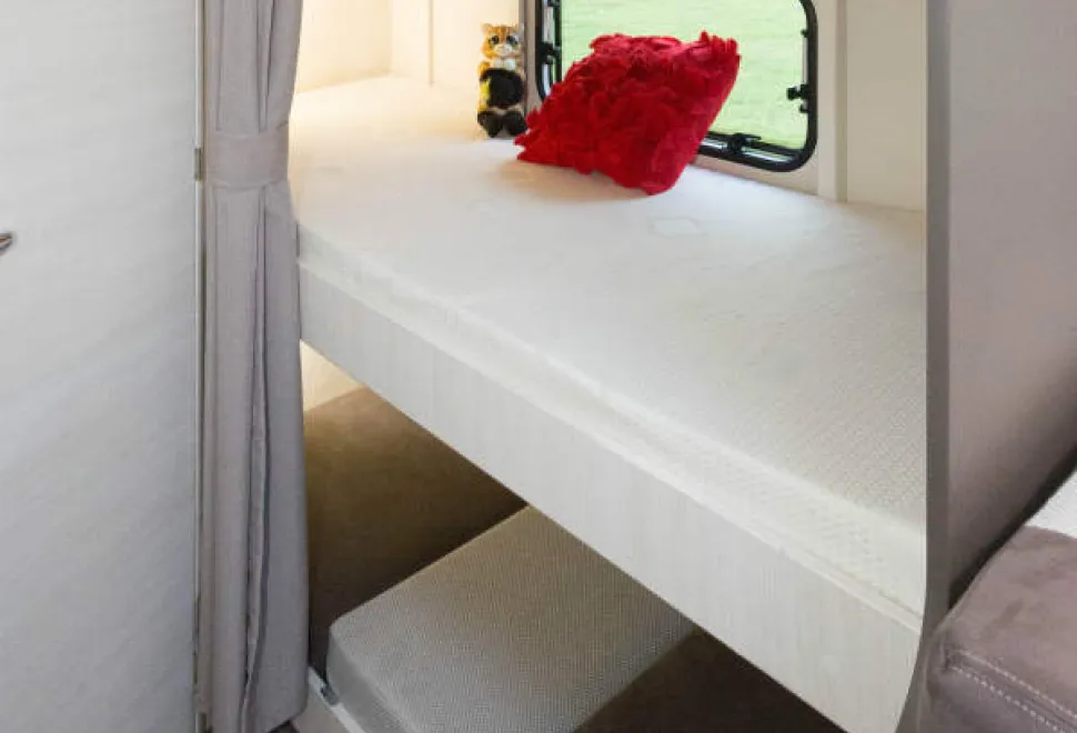 Beds-for-three-little-caravanners-and-the-base-bunk-lifts-to-create-storage-space-78904