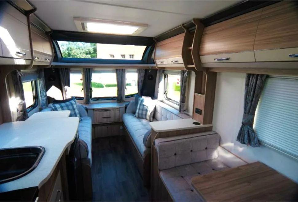 A-side-dining--area,-a-long-kitchen-(plus-an-extension)-and-a-lounge-long-enough-to-be-used-as-single-beds-25673