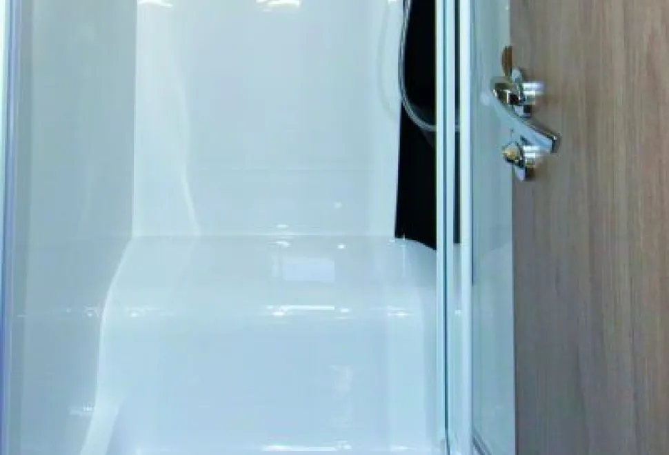Bright-white-light-shines-from-above-the-shower-mounting-panel--41228