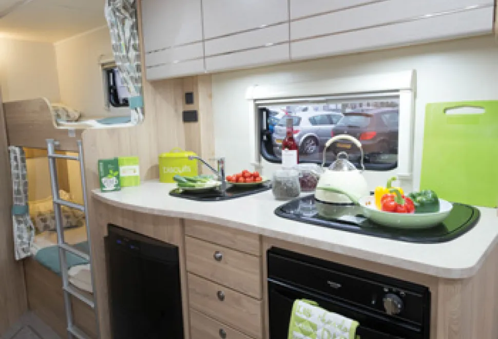 Three-drawers-and-a-cabinet,-all-37cm-wide,-between-the-fridge-and-the-oven-grill,-plus-space-beneath-it-25564