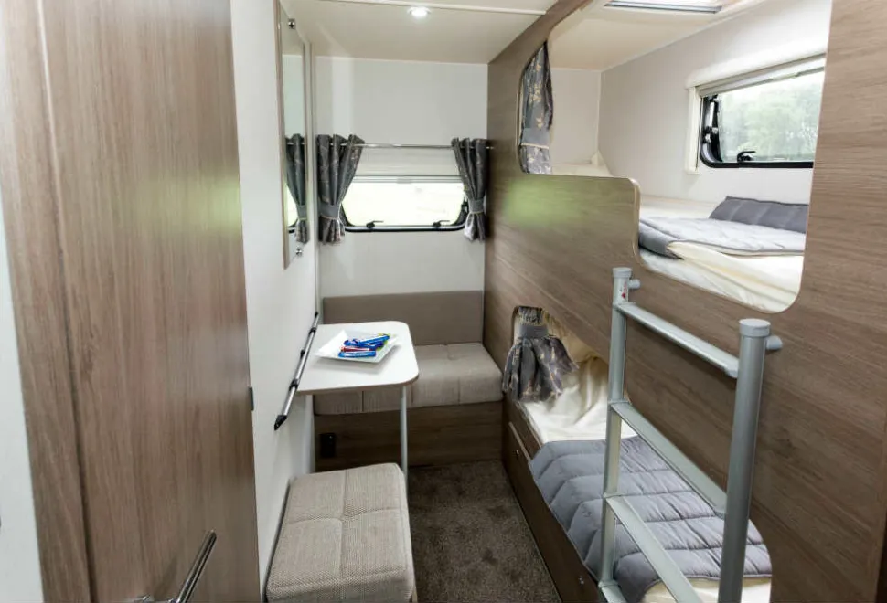 Two-bunks-in-secluded-pods-and-a-little-seating-area-34167