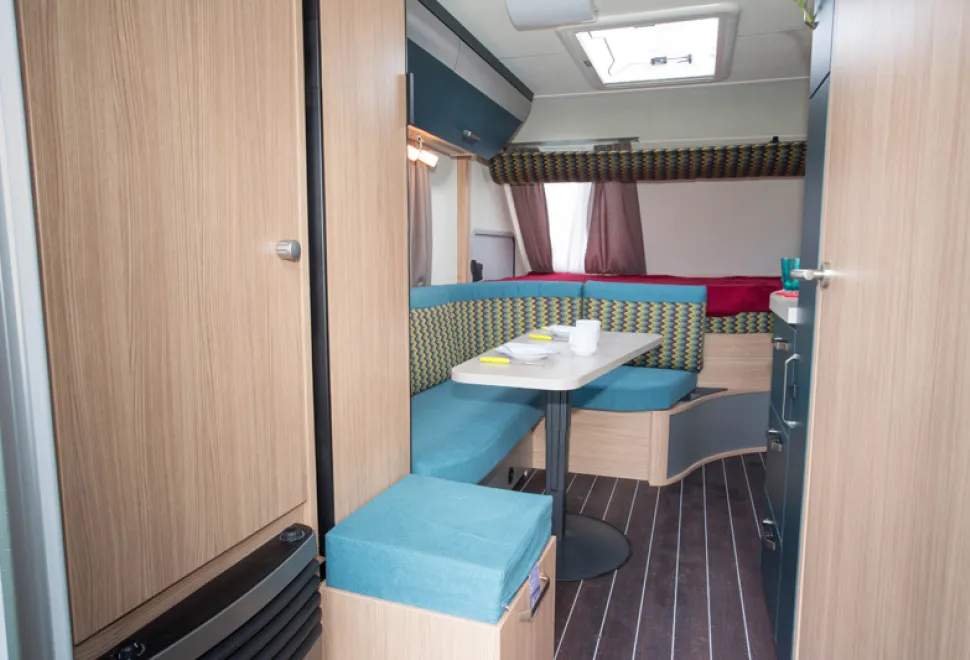 web-The-extra-dining-seat-pulls-out-from-under-the-fridge-81440