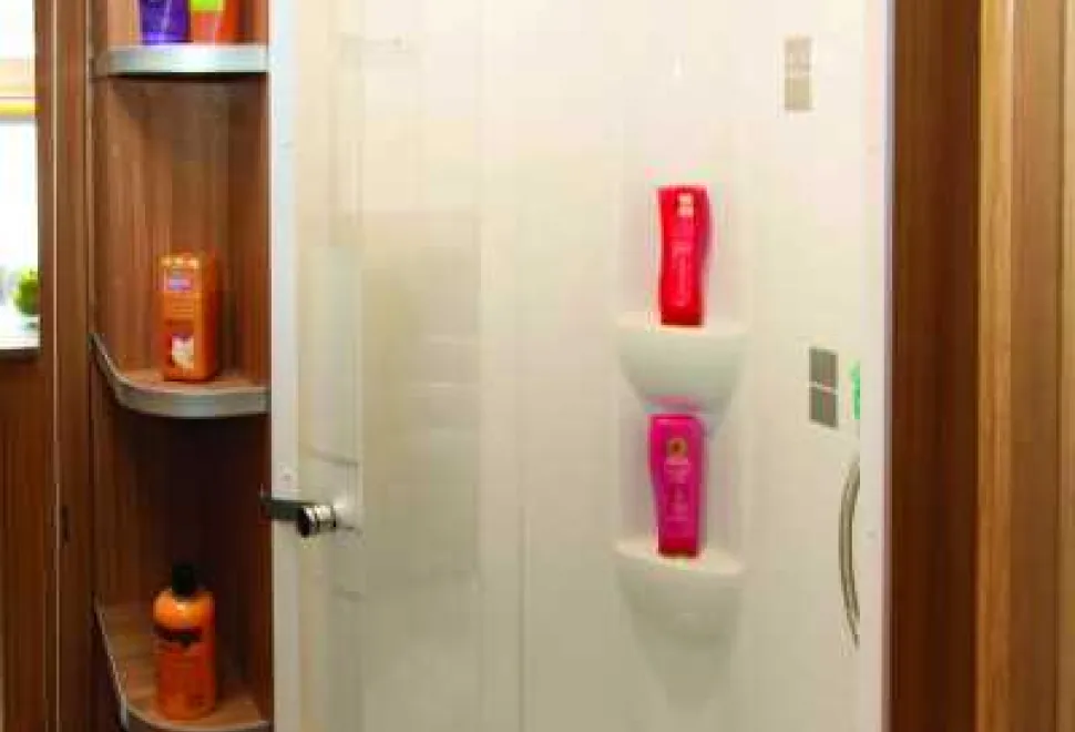 Plenty-of-shelves-for-shampoos-in-the-shower-cubicle-and-plenty-more-alongside,-too-39900