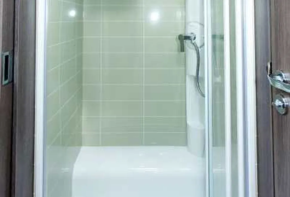 A-pull-out-towel-rail-is-on-the-shower-cubicle-wall-37687