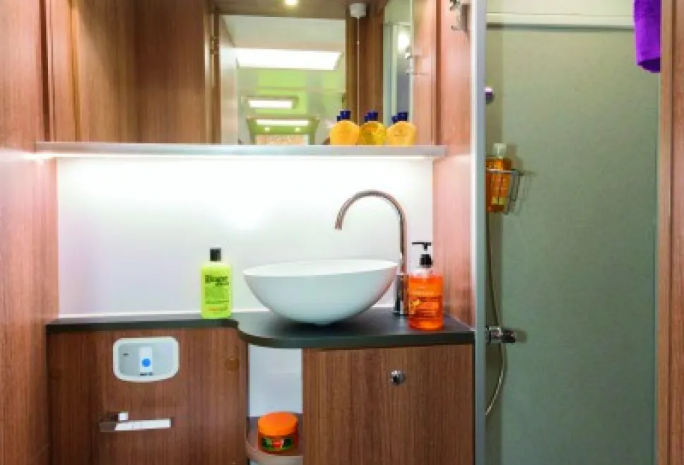 Brilliant-lighting-and-plenty-of-shelves-in-the-shower-room-88089