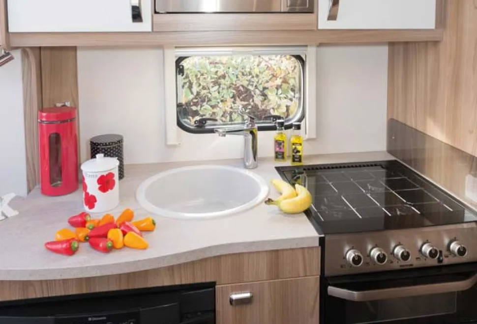 The-large-circular-sink-is-made-of-a-durable-white-marble-look-substance,-91278
