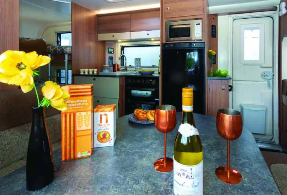 The-extra-width-creates-an-enormous-dining-kitchen-area-07005