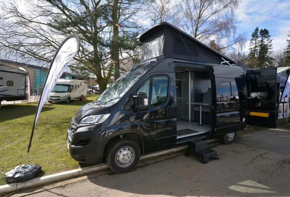 The Custom Built Campervans high-top rising roof campervan