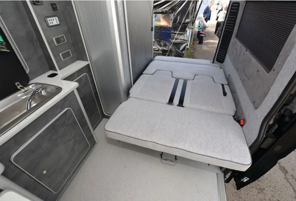 The Custom Built Campervans high-top rising roof campervan bed