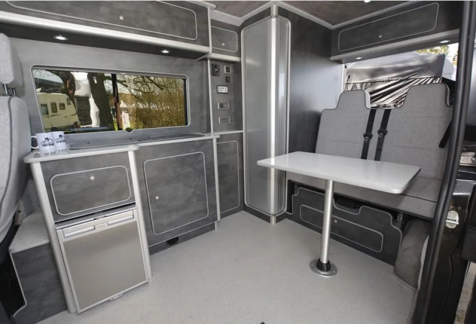 The Custom Built Campervans high-top rising roof campervan interior