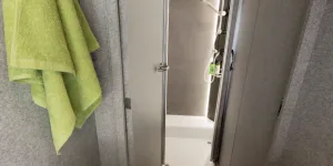 Dethleffs Trend I 7057 EBL 2025 A-class across the width washroom shut off from bedroom and lounge