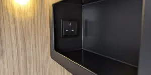 One of the recessed shelves next to the island bed - this one has a three-pin mains socket, but the other one has USB-A and USB-C