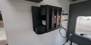 The coffee machine slides out on a sturdy bracket for access