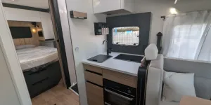 The kitchen comes with an optional oven but this does impact storage here