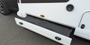An unexpected skirt locker for mucky campsite items, like levelling ramps
