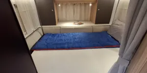 The bedroom inside the Bailey Adamo XL-DL motorhome