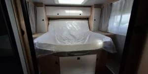 The bedroom inside the Hobby OnTour C 700 GQ 2025