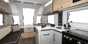 The L-shape of the kitchen creates a large amount of surface space