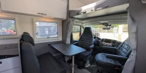Etrusco A 6.9 SB 2026 motorhome showing lounge and overcab bed base lowered