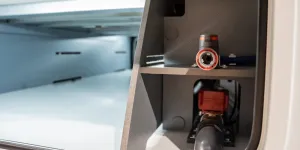 Water filling (with Hozelock-style attachment) and emptying point in double floor access by side locker door: Frankia Noctra Cruiser 7.6L