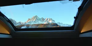 Bailey Alora 69-4S motorhome view of the Italian alps through the overcab skylight