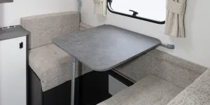 A seating area that transforms into bunks 2