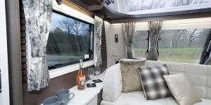 The television wall has a window, so plenty of daylight enters the lounge