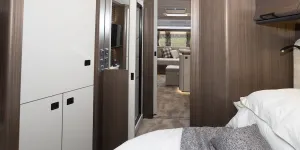 The white sliding doors on both the front and rear of the shower room have magnetic catches.