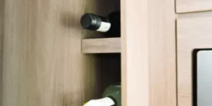 Shelves-proportioned-perfectly-for-wine-bottles-alongside-the-microwave-and-fridge-w350-86094