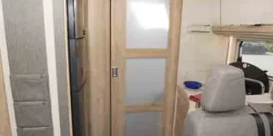 Eura-Mobil-Integra-door-to-bedroom-78550