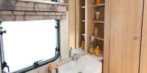 web-5-Plenty-of-shelving-in-the-rear-shower-room-31954