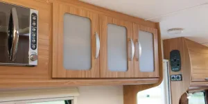 rhp_Three top kitchen cabinets have opaque frosted plastic door inserts
