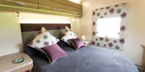 We-love-the-fabric-panels-aroiund-the-bedroom-windows!-48878