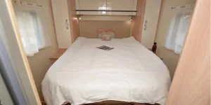 The Giottiline Siena 397 low-profile motorhome bedroom